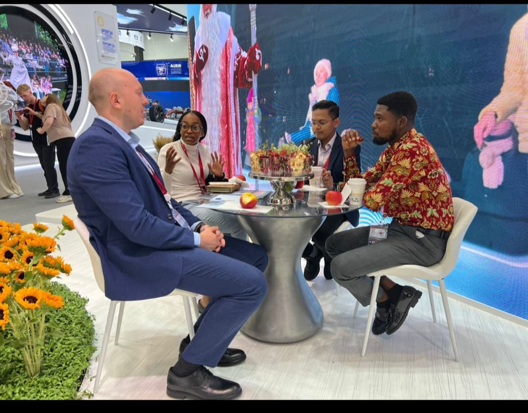 Richard in dialogue with delegates at an international expo